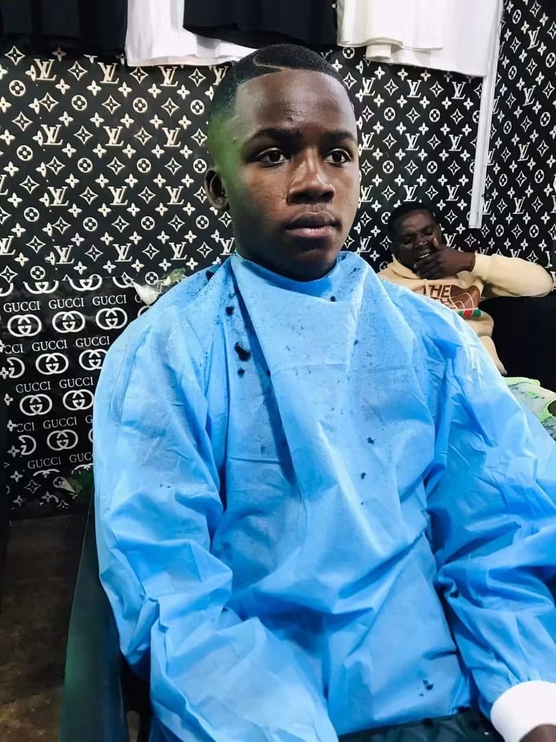 Livelihood empowerment — barbering gowns for a Chipata youth